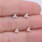 14k gold round dainty lab grown diamond earrings, detailed close-up showing fine craftsmanship