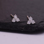 14k gold round dainty lab grown diamond earrings, styled on model showing fine craftsmanship
