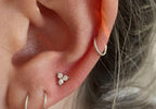 14k gold round dainty lab grown diamond earrings, three-quarter view showing fine craftsmanship