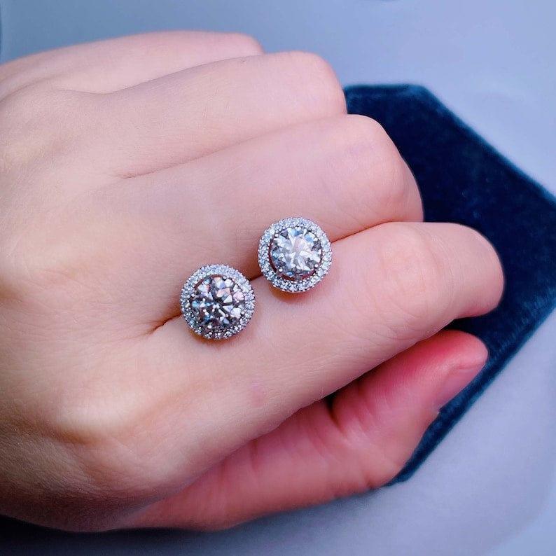 14k gold round halo lab grown diamond stud earrings, detailed close-up showing fine craftsmanship
