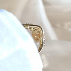 14k gold oval vintage lab grown diamond engagement ring, three-quarter view showing fine craftsmanship