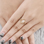 14k gold oval vintage lab grown diamond engagement ring, lifestyle shot showing fine craftsmanship
