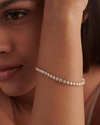 14k gold lab grown diamond tennis bracelet, styled on model showing fine craftsmanship for elegant everyday wear