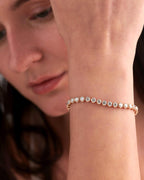14k gold lab grown diamond tennis bracelet, detailed close-up showing fine craftsmanship