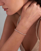 14k gold lab grown diamond tennis bracelet, styled on model showing fine craftsmanship