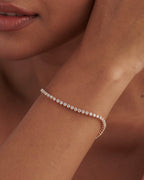 14k gold lab grown diamond tennis bracelet, detailed close-up showing fine craftsmanship with brilliant sparkle