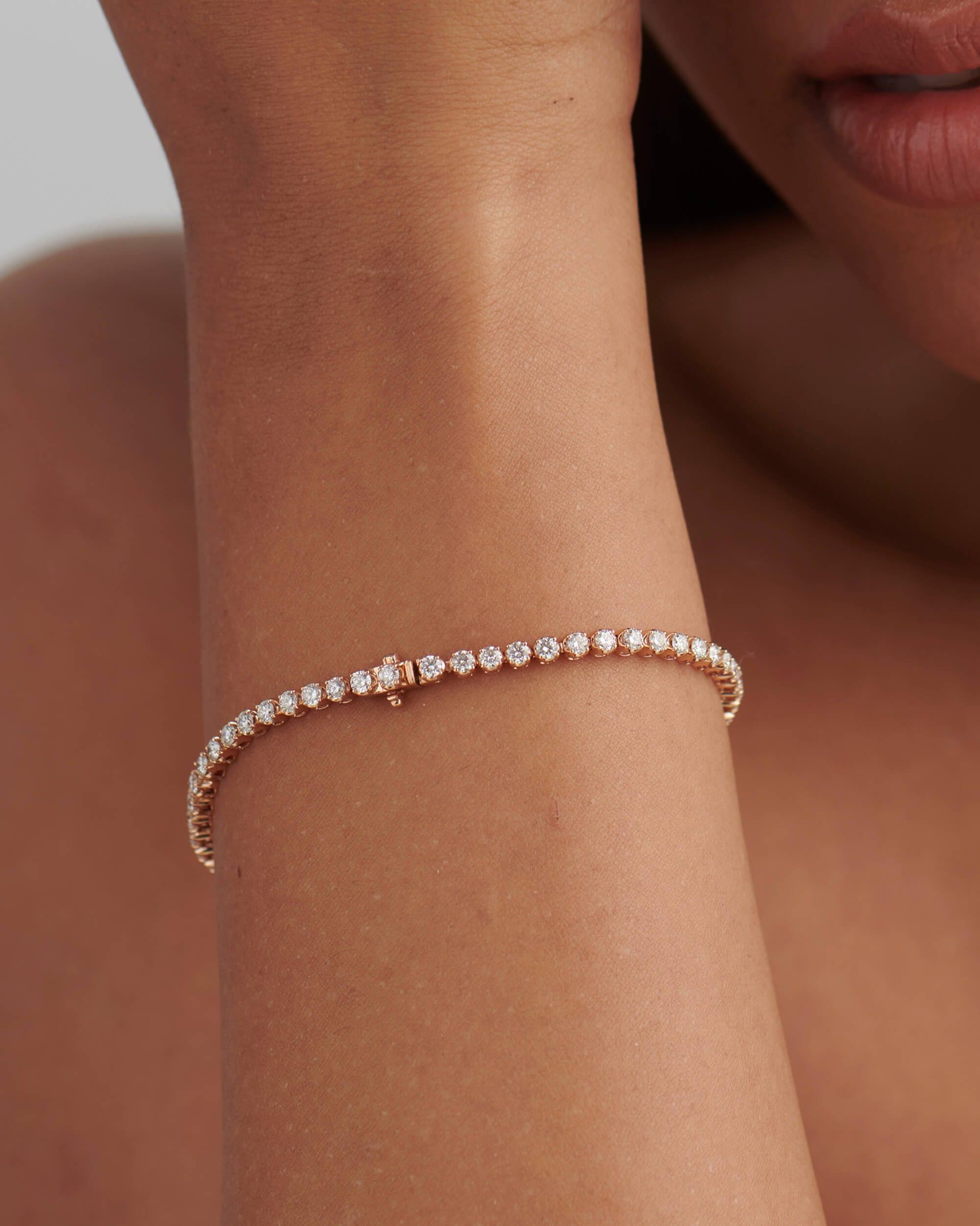 14k gold lab grown diamond tennis bracelet, styled on model showing fine craftsmanship with brilliant sparkle