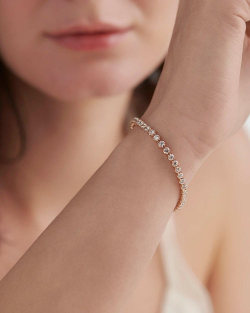 14k gold lab grown diamond tennis bracelet, detailed close-up showing fine craftsmanship and a polished finish
