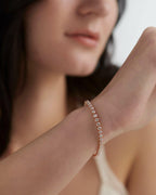 14k gold lab grown diamond tennis bracelet, side profile view showing fine craftsmanship and a polished finish