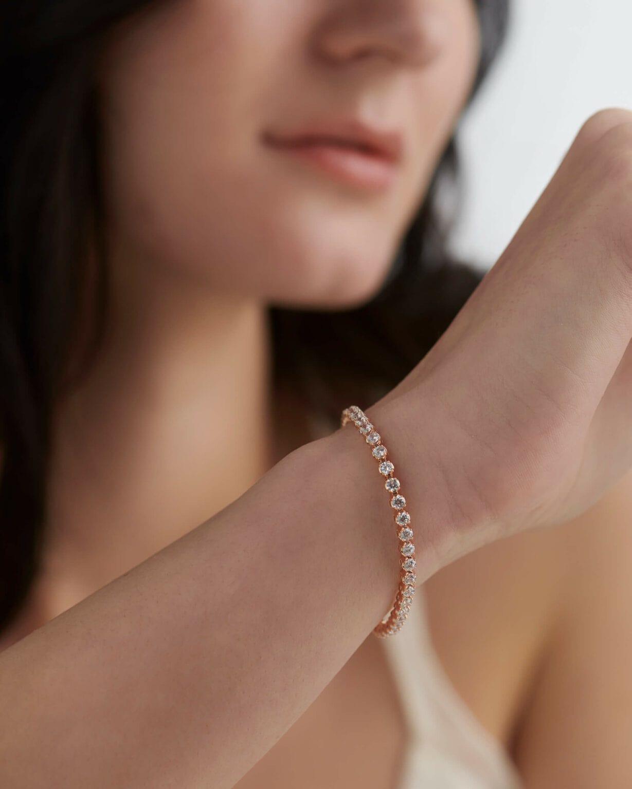 14k gold lab grown diamond tennis bracelet, side profile view showing fine craftsmanship and a polished finish
