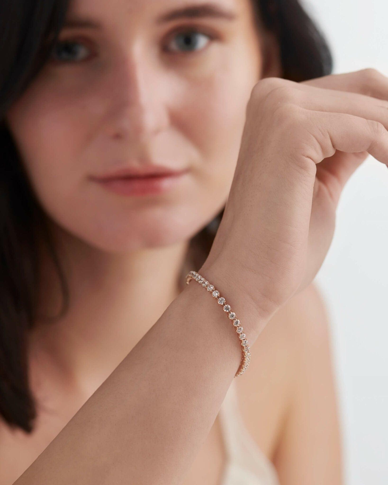 14k gold lab grown diamond tennis bracelet, styled on model showing fine craftsmanship and a polished finish