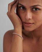 14k gold lab grown diamond tennis bracelet, styled on model showing fine craftsmanship with a secure setting