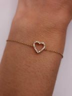 14k gold heart dainty lab grown diamond bracelet, detailed close-up showing fine craftsmanship