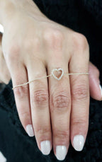 14k gold heart dainty lab grown diamond bracelet, styled on model showing fine craftsmanship