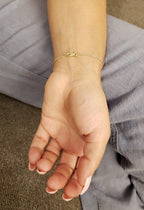14k gold heart dainty lab grown diamond bracelet, sparkle detail shot showing fine craftsmanship