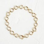 14k gold satellite lab grown diamond tennis bracelet, detailed close-up showing fine craftsmanship