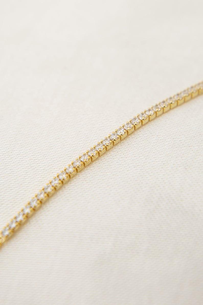 14k gold lab grown diamond tennis bracelet, styled on model showing fine craftsmanship by Bright Diamond Jewels