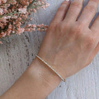 14k gold tennis lab grown diamond bangle bracelet, side profile view showing fine craftsmanship with brilliant sparkle