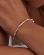 14k gold tennis lab grown diamond bangle bracelet, front view showing fine craftsmanship