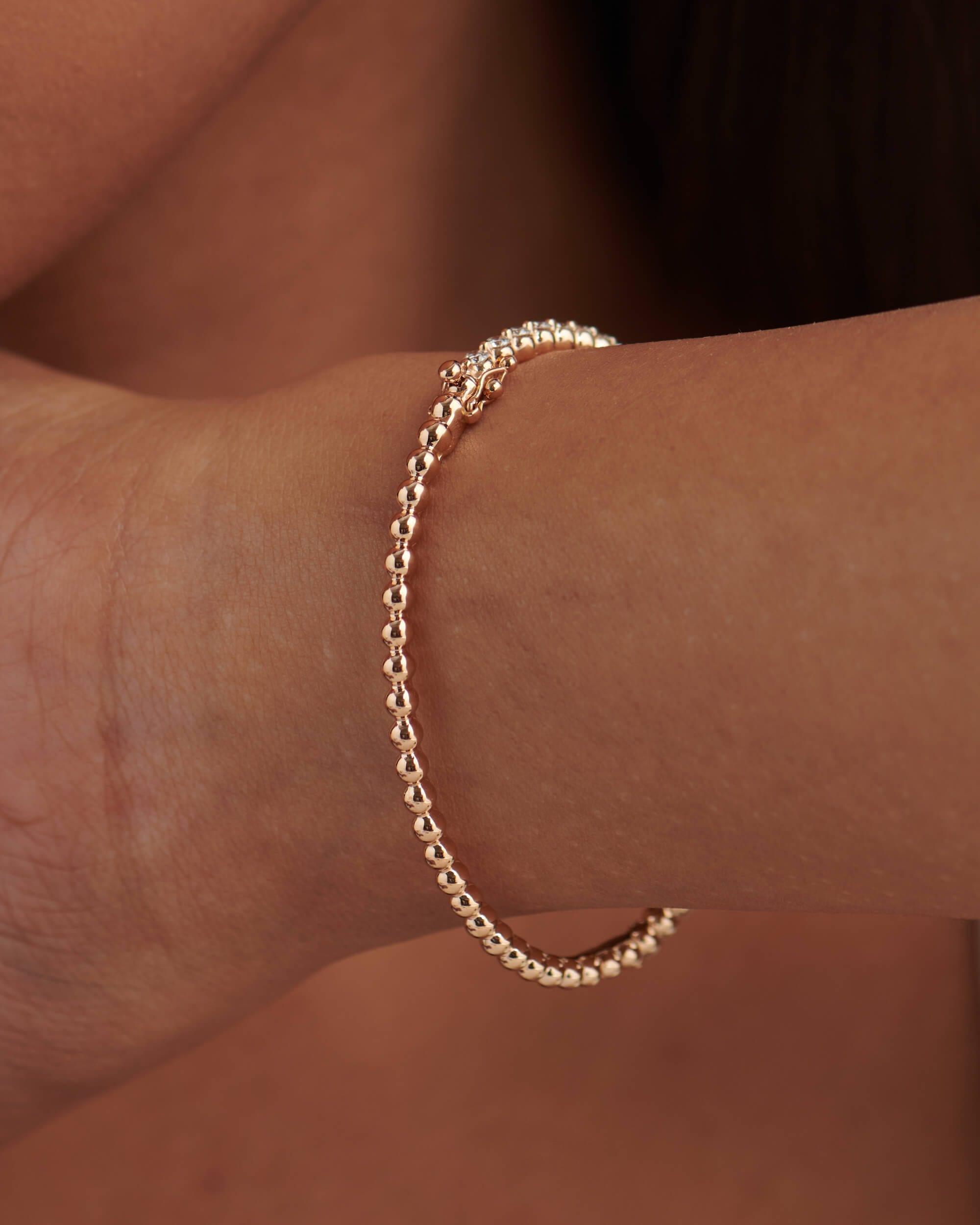 14k gold tennis lab grown diamond bangle bracelet, detailed close-up showing fine craftsmanship