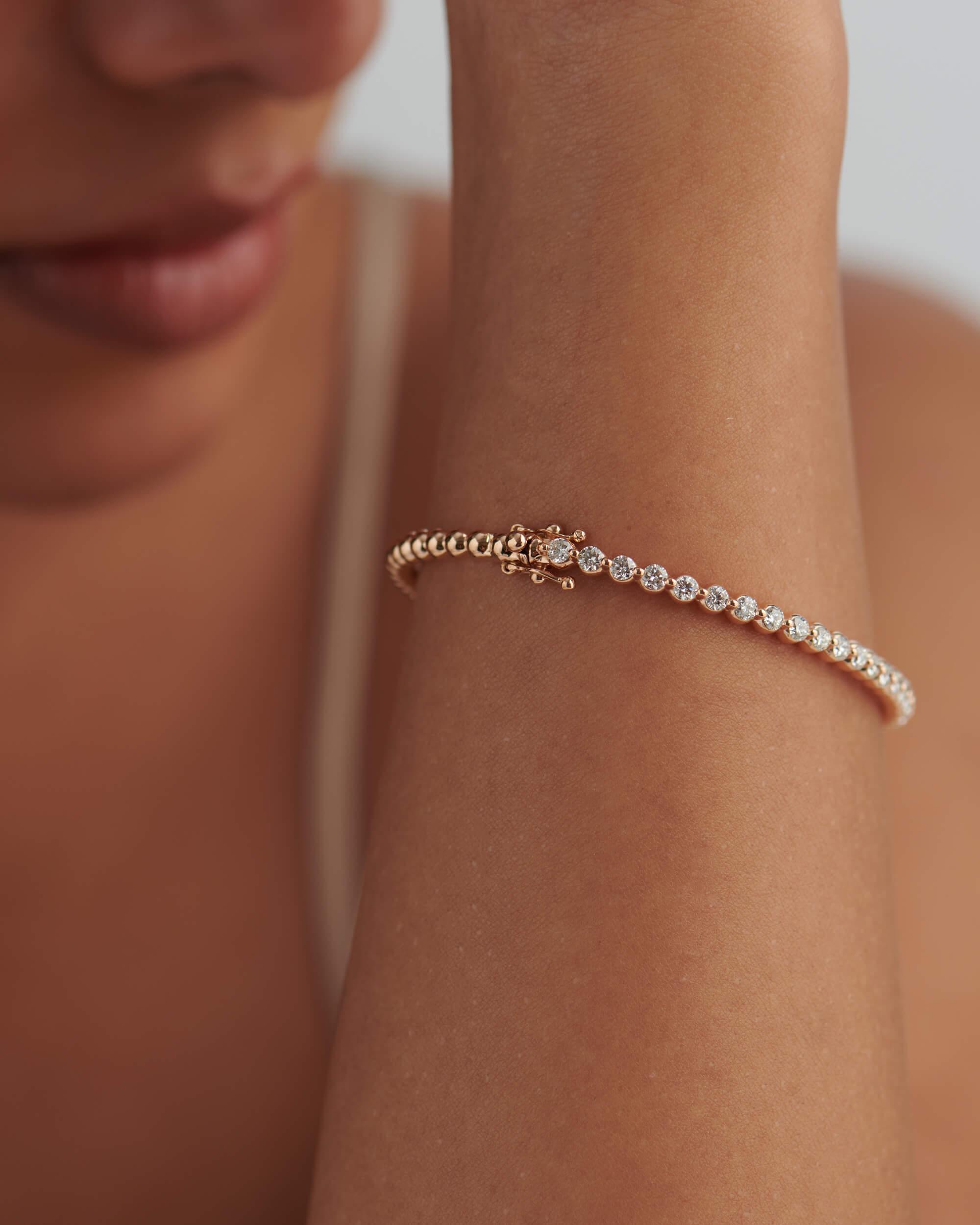 14k gold tennis lab grown diamond bangle bracelet, side profile view showing fine craftsmanship