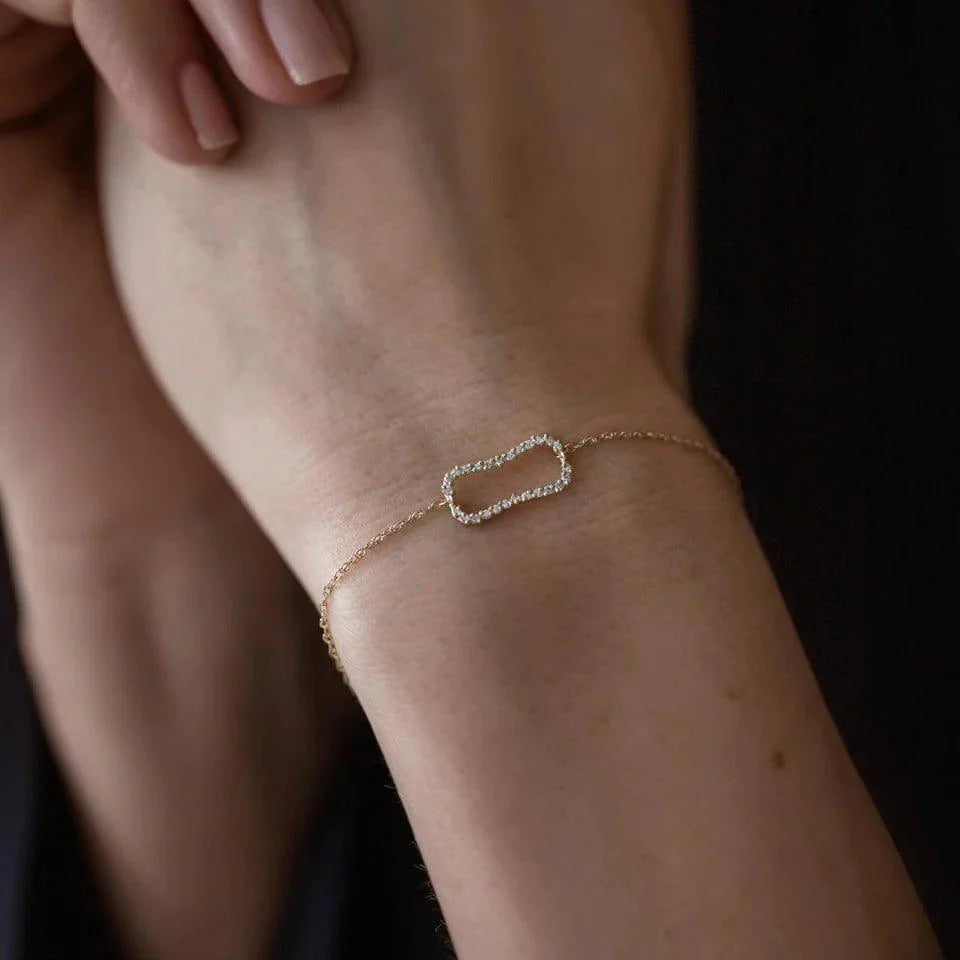 14k gold lab grown diamond bracelet, side profile view showing fine craftsmanship and a polished finish