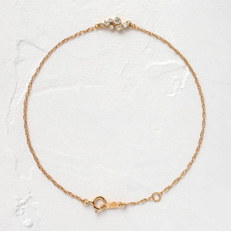 14k gold dainty lab grown diamond bracelet, detailed close-up showing fine craftsmanship with brilliant sparkle