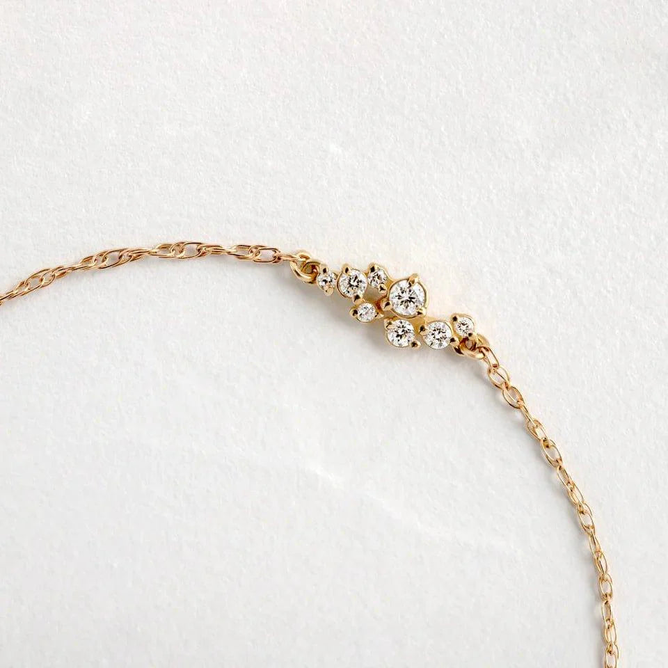 14k gold dainty lab grown diamond bracelet, side profile view showing fine craftsmanship with brilliant sparkle