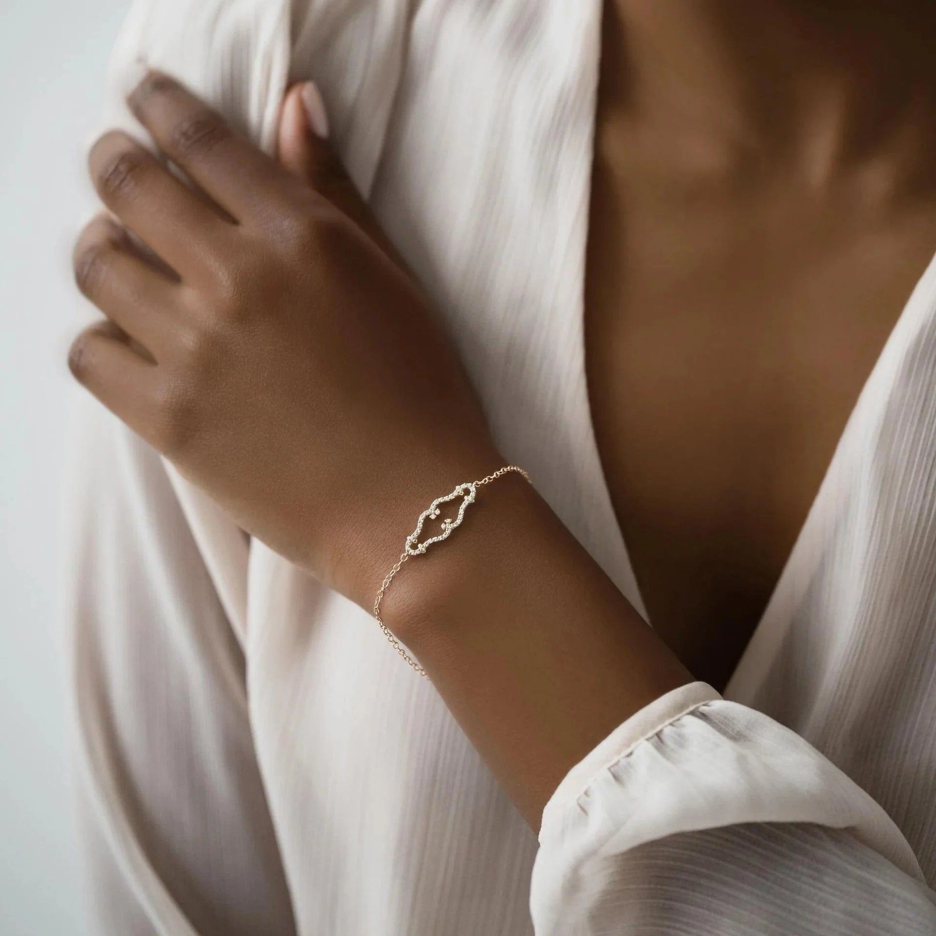 14k gold lab grown diamond bracelet, styled on model showing fine craftsmanship and a polished finish
