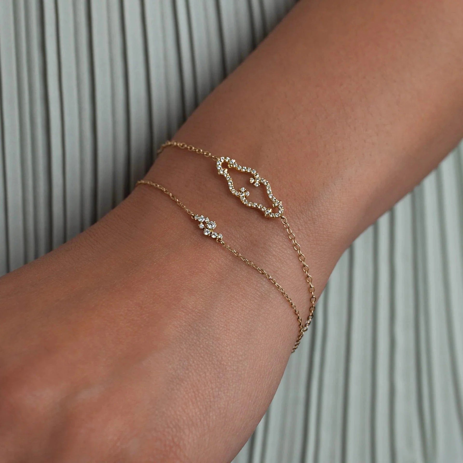 14k gold lab grown diamond bracelet, top angle view showing fine craftsmanship and a polished finish