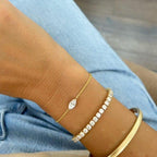 14k gold marquise dainty lab grown diamond bracelet, detailed close-up showing fine craftsmanship