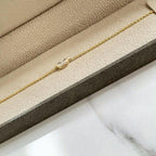 14k gold marquise dainty lab grown diamond bracelet, styled on model showing fine craftsmanship