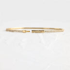 14k gold round lab grown diamond tennis bracelet, styled on model showing fine craftsmanship