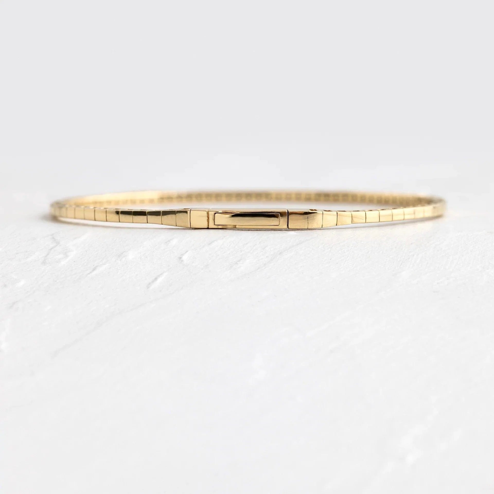 14k gold round lab grown diamond tennis bracelet, three-quarter view showing fine craftsmanship
