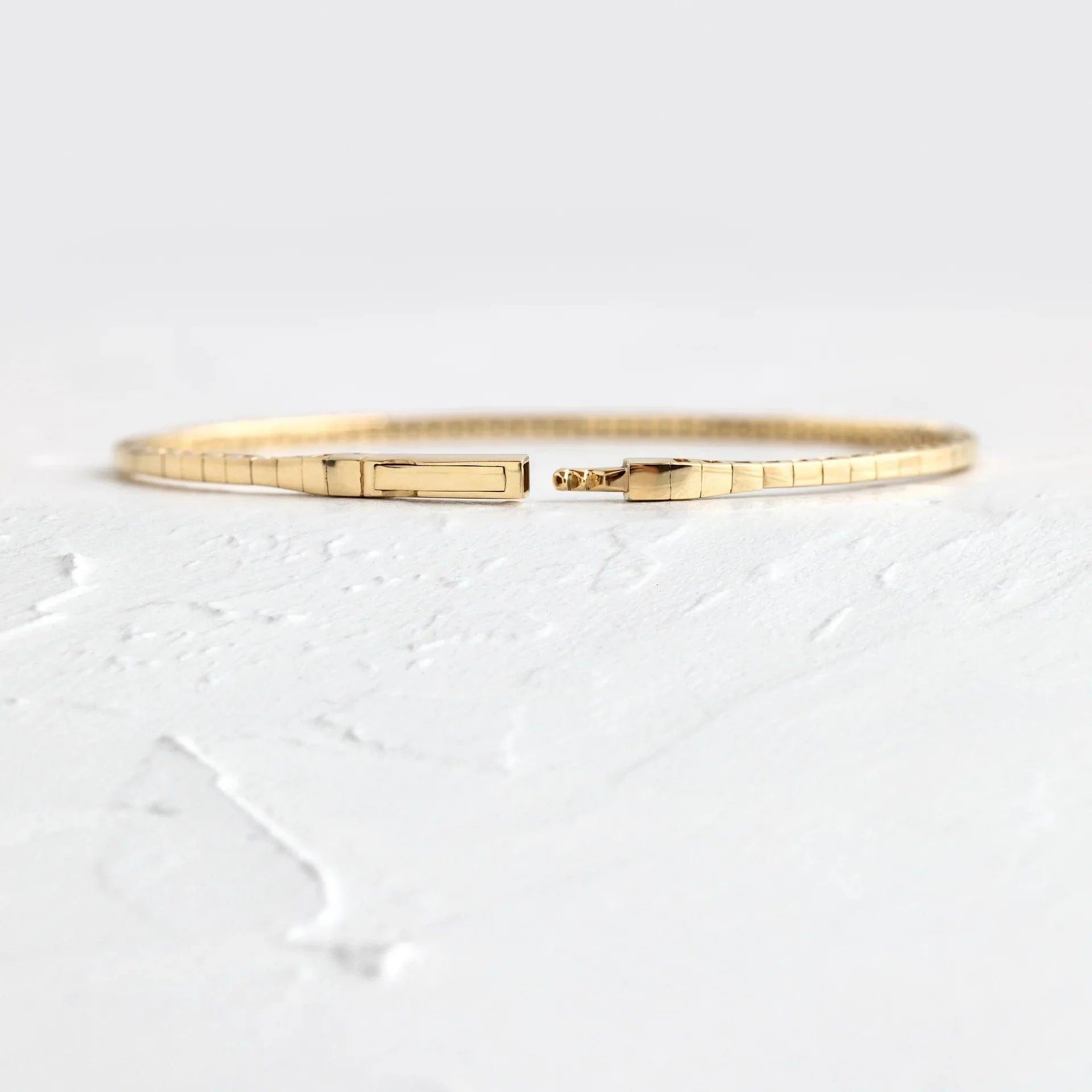 14k gold round lab grown diamond tennis bracelet, lifestyle shot showing fine craftsmanship