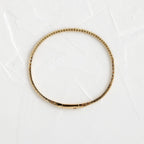 14k gold round lab grown diamond tennis bracelet, macro detail view showing fine craftsmanship