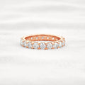 14k gold round lab grown diamond eternity band, front view showing fine craftsmanship and a polished finish