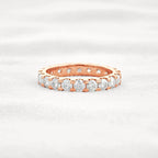 14k gold round lab grown diamond eternity band, front view showing fine craftsmanship and a polished finish