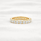 14k gold round lab grown diamond eternity band, styled on model showing fine craftsmanship with brilliant sparkle