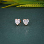14k yellow gold heart screw back lab grown diamond stud earrings, styled on model showing fine craftsmanship