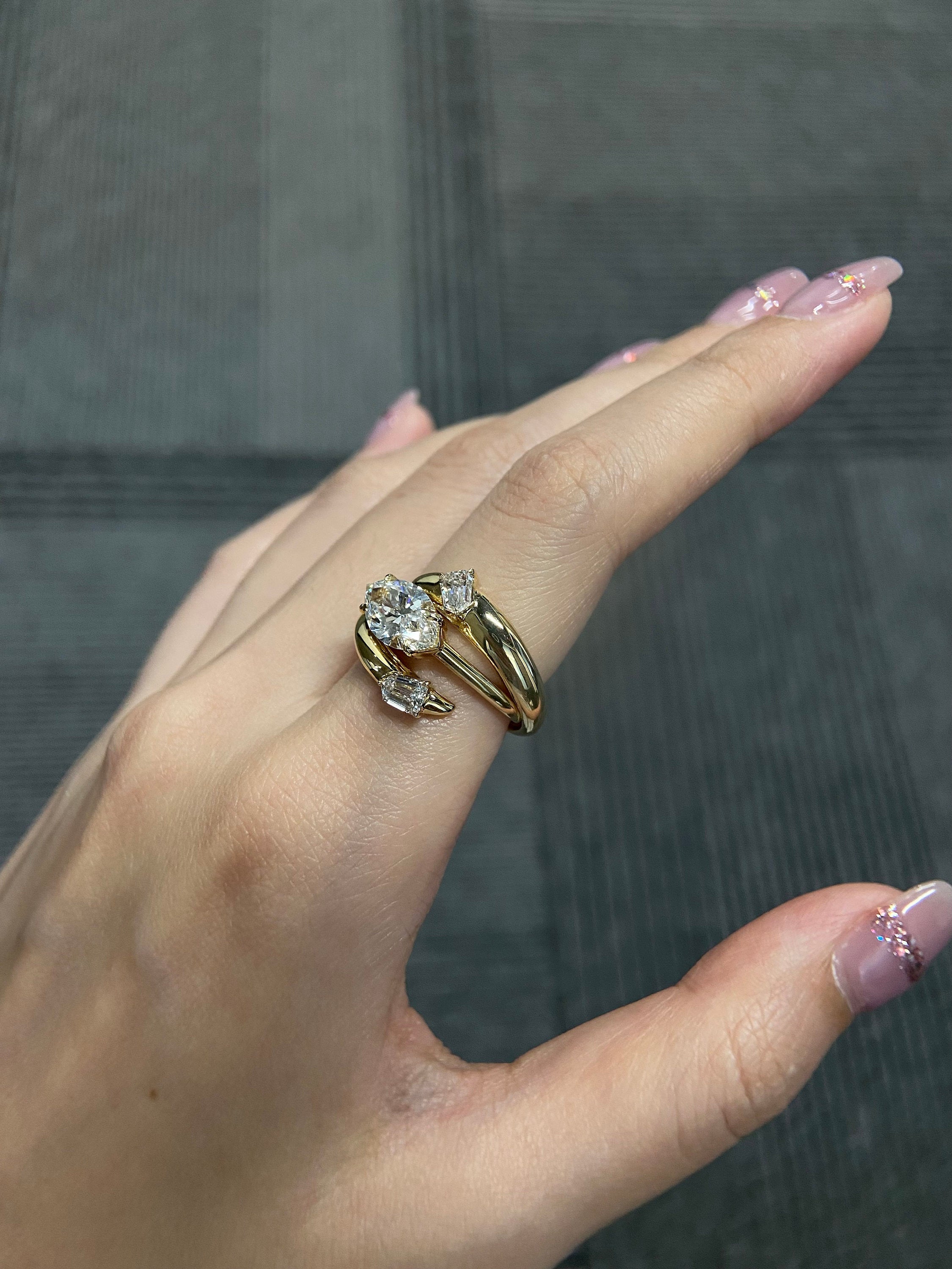 14k gold marquise three-stone lab grown diamond engagement ring, sparkle detail shot showing fine craftsmanship