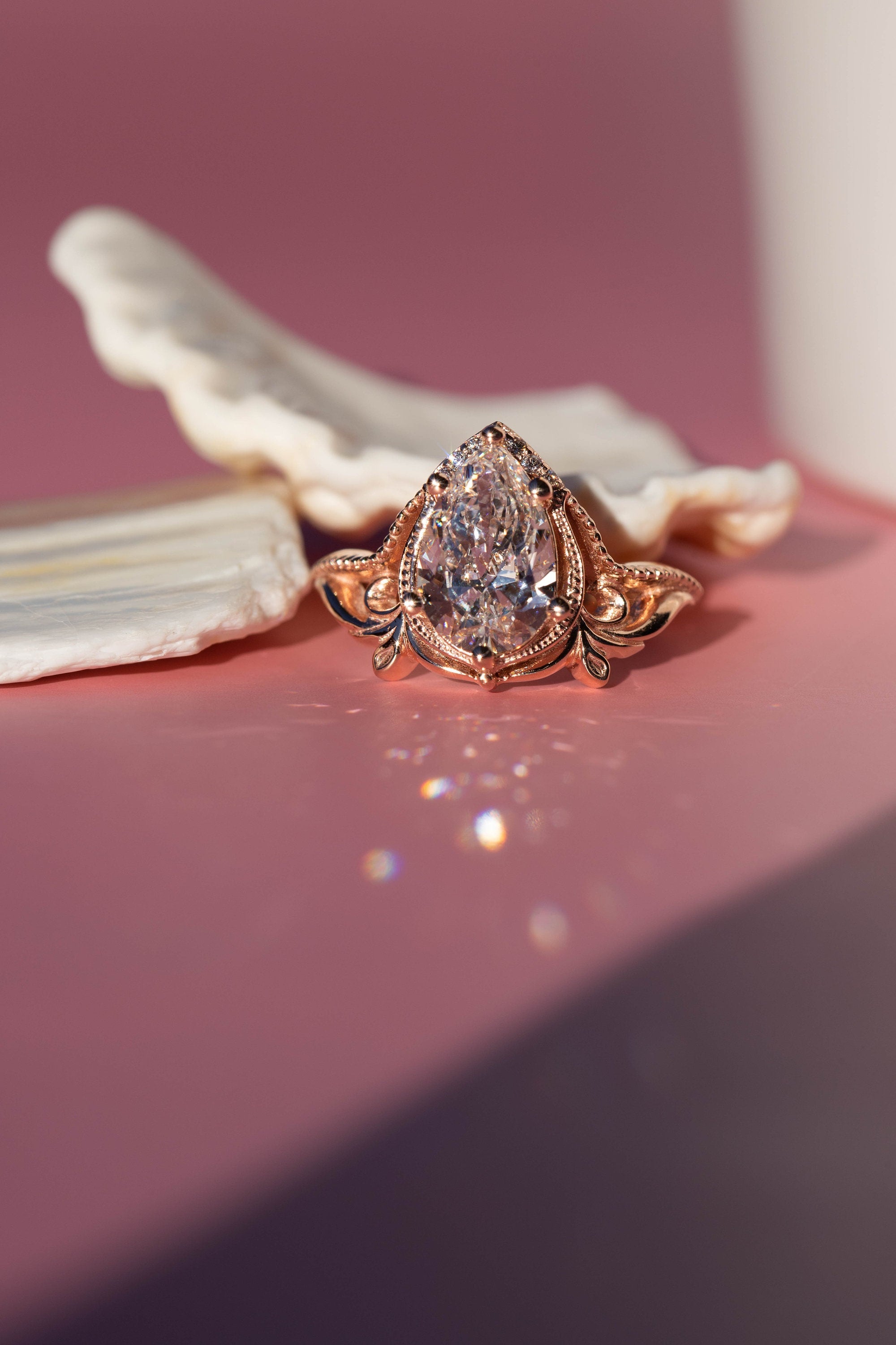 14k gold pear art nouveau lab grown diamond engagement ring, top angle view showing fine craftsmanship