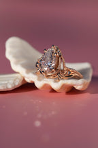 14k gold pear art nouveau lab grown diamond engagement ring, lifestyle shot showing fine craftsmanship