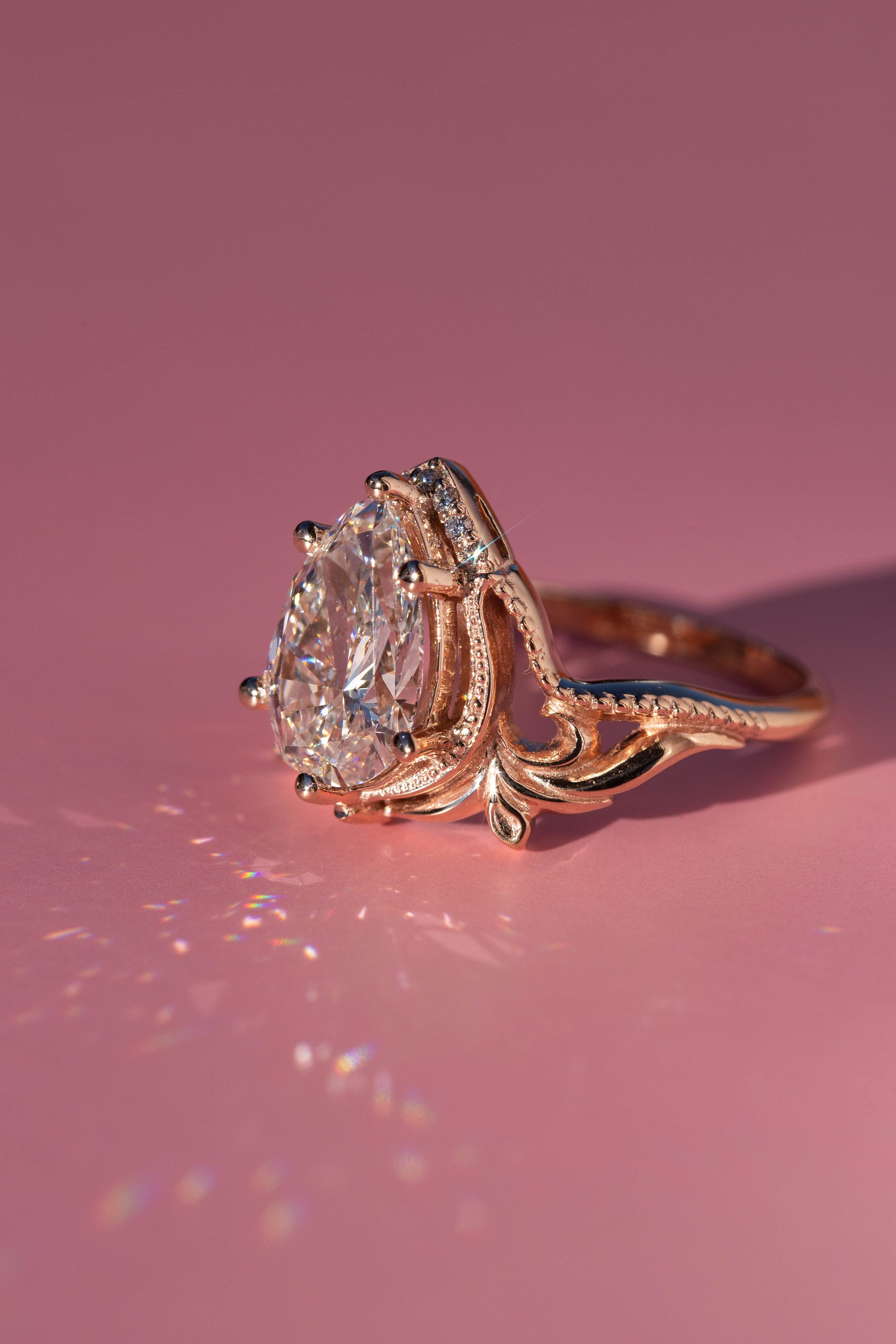 14k gold pear art nouveau lab grown diamond engagement ring, sparkle detail shot showing fine craftsmanship