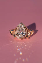14k gold pear art nouveau lab grown diamond engagement ring, styled on model showing fine craftsmanship