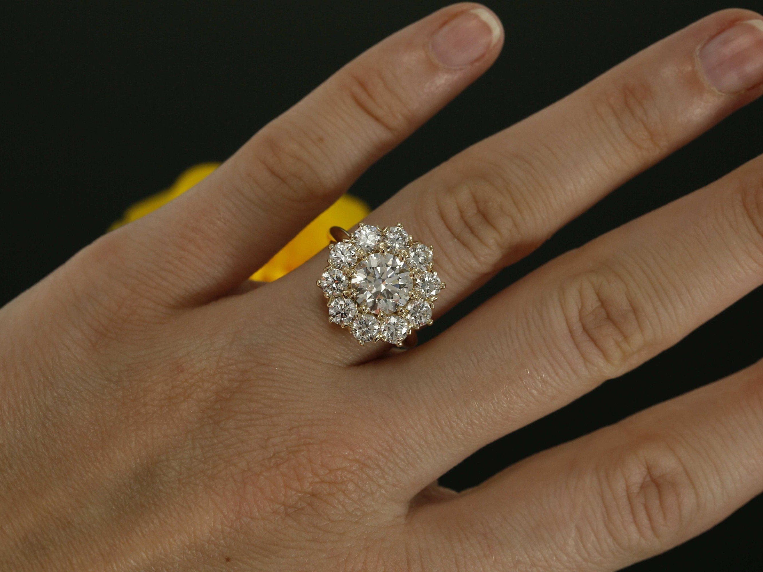 14k gold halo lab grown diamond engagement ring, lifestyle shot showing fine craftsmanship