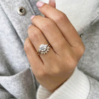 14k gold round three-stone lab grown diamond engagement ring, top angle view showing fine craftsmanship
