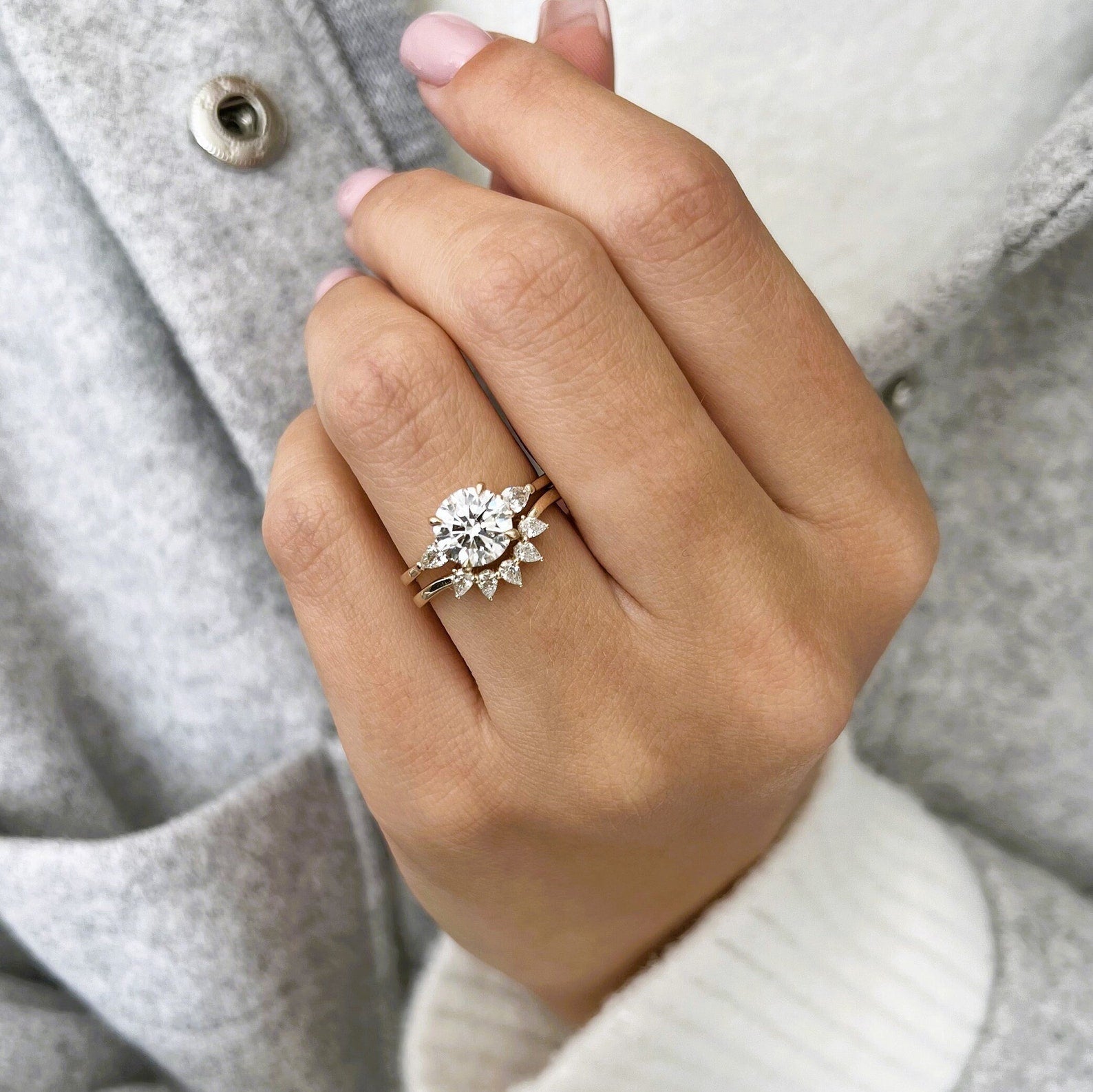 14k gold round three-stone lab grown diamond engagement ring, top angle view showing fine craftsmanship