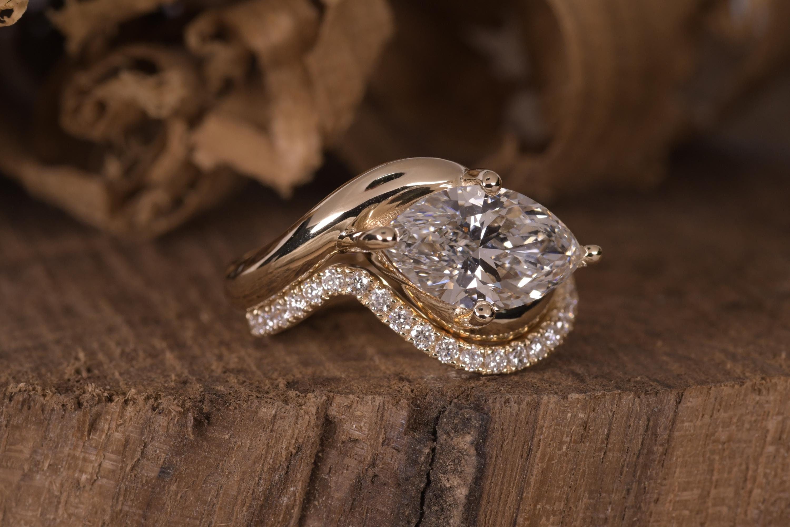 14k gold marquise bridal set lab grown diamond engagement ring, detailed close-up showing fine craftsmanship