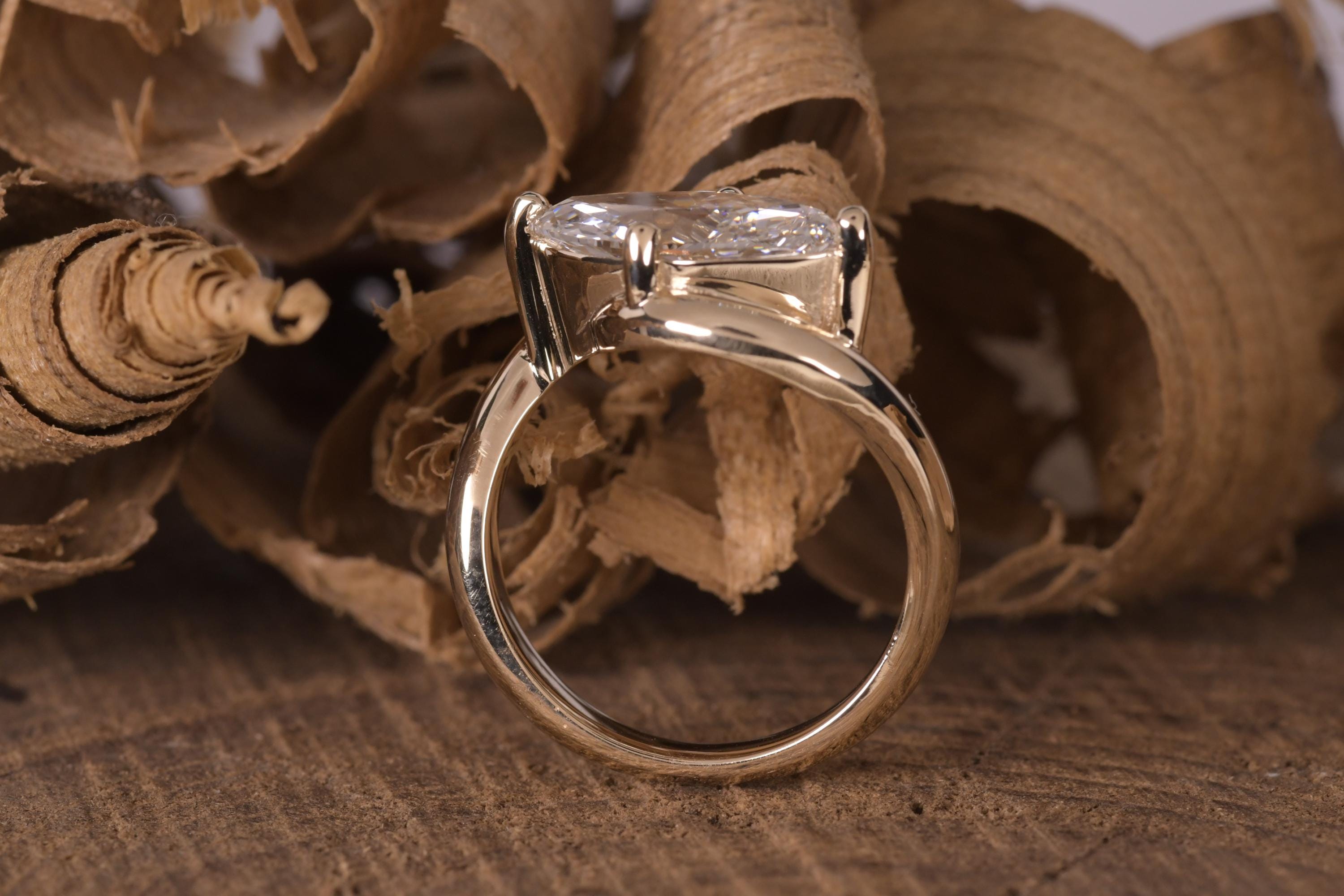 14k gold marquise bridal set lab grown diamond engagement ring, side profile view showing fine craftsmanship